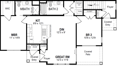 A floor plan of a house with a kitchen, living room, dining room, and two bathrooms.